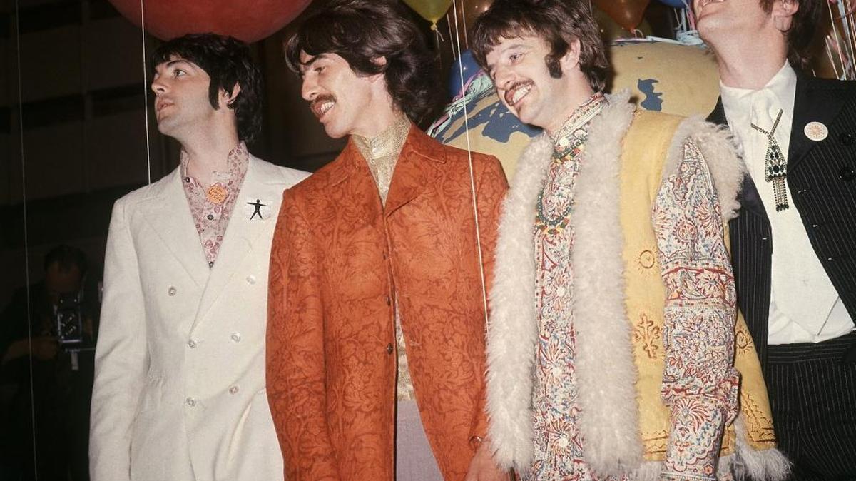 In this June 1967 file photo, Paul McCartney, from left, George Harrison, Ringo Starr and John Lennon of The Beatles appear backstage during a break in rehearsals for the live broadcast on the "Our World" program at EMI studios in London. Half a century after the Beatlesâ€™ psychedelic landmark, "Sgt. Pepper's Lonely Hearts Club Band" album, it stands as just one of many musical astonishments of 1967 that shaped what we listen to now.