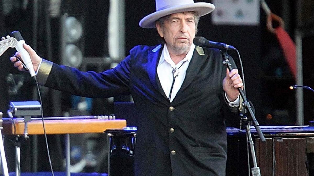 This July 22, 2012 file photo shows U.S. singer-songwriter Bob Dylan performing on stage at "Les Vieilles Charrues" Festival in Carhaix, western France. The Bob Dylan Archive has opened in Oklahoma, more than a year after the announcement that more than 6,000 items spanning the music icon's six-decade career would be housed in Tulsa.