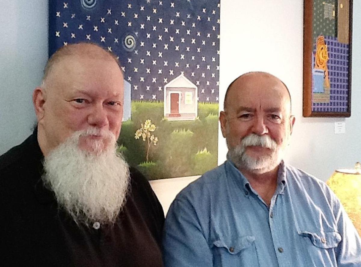 Jeff Storer and Ed Hunt, founders of Manbites Dog Theater, in the lobby of the theater off Foster Street in Durham.