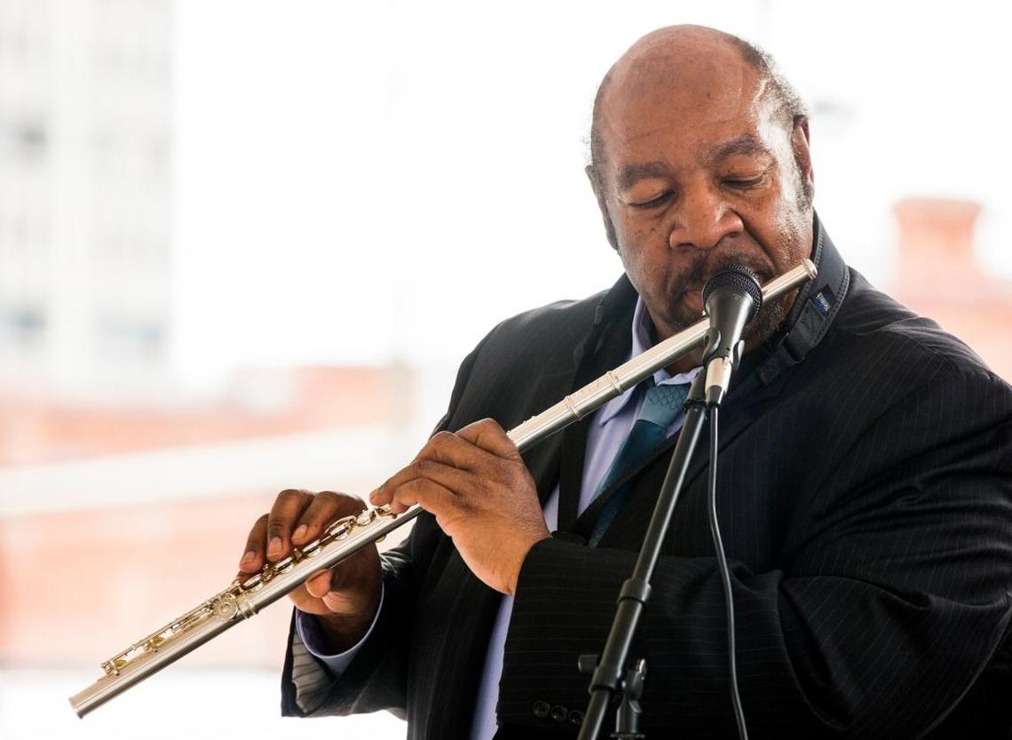 Ira Wiggins performs at the opening reception for a new exhibit about jazz at the Museum of Durham History.