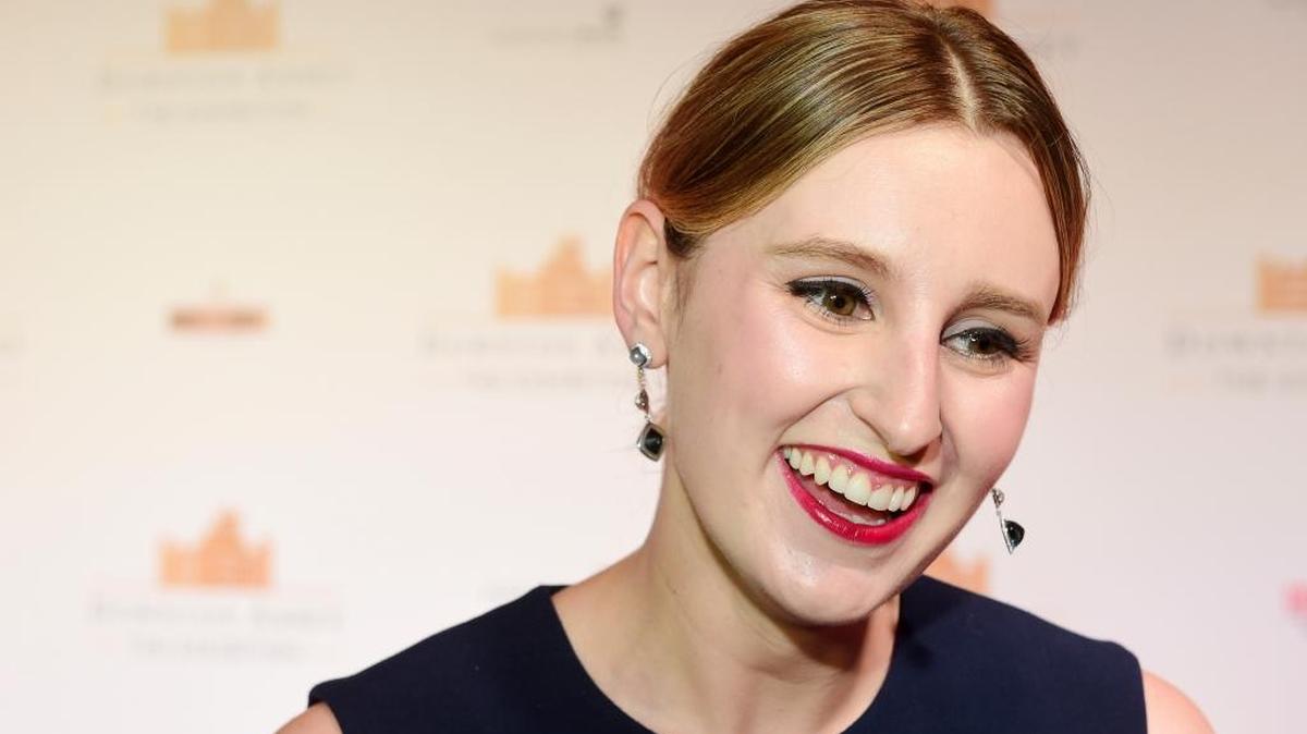 British actress Laura Carmichael and star of Downton Abbey speaks to media on the red carpet at the launch of an exhibition about the television series at the Marina Bay Sands on Wednesday, June 21, 2017 in Singapore.