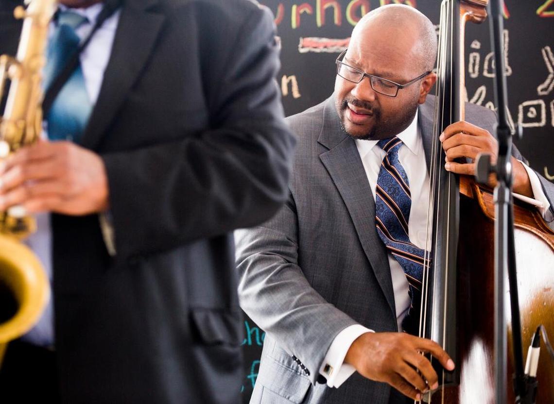 John Brown performs at the opening reception for a new exhibit about jazz at the Museum of Durham History.