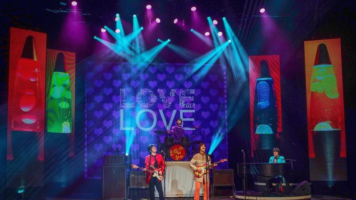 “RAIN: A Tribute to the Beatles” is a live, multi-media concert that is a note-for-note theatrical event. George: Alastar McNeil, John: Steve Landes, Paul: Paul Curatolo, Ringo: Aaron Chiazza