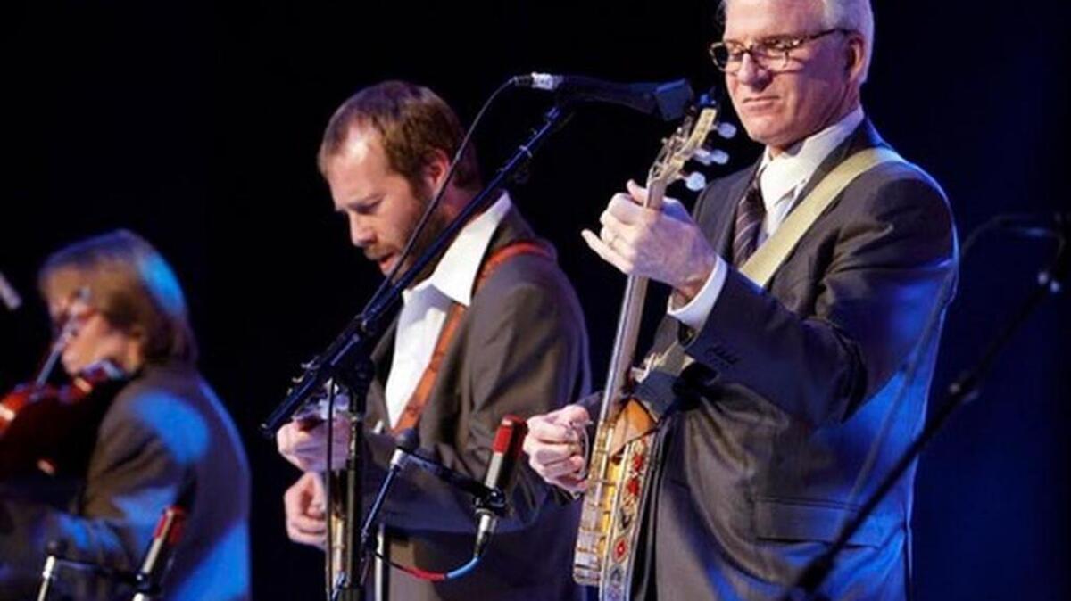 Steve Martin, right, with Graham Sharp of the Steep Canyon Rangers. AP photo.