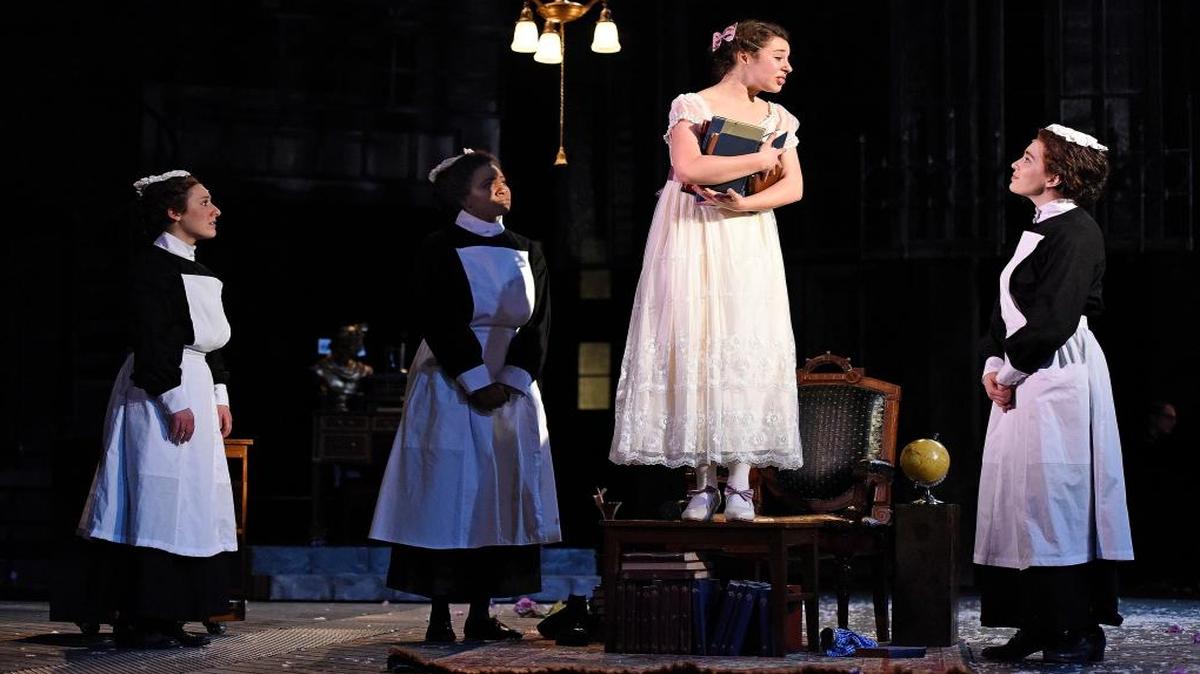 From left, Catherine Baird, Shanelle Nicole Leonard, Mia Pinero as Eliza Doolittle, and Jenny Latimer in PlayMakers Repertory Company’s production of “My Fair Lady.”
