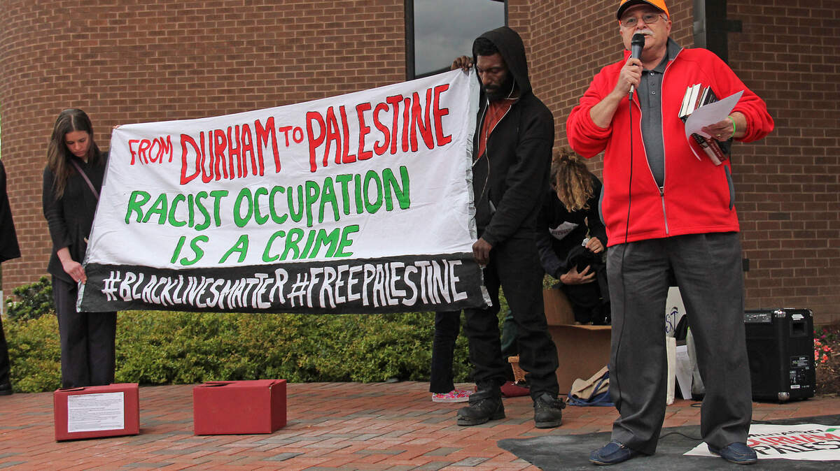 Jihad Shawwa, a retired engineer for the NC Department of Transportation, speaks at a rally outside Durham City Hall on Monday, April 16, 2018, opposing police training partnerships with Israel. "These are savages that are controlling Israel," said Shawwa, who is originally from Gaza. "These are not human beings."