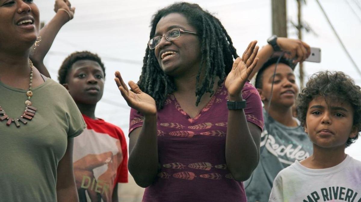 The Durham For All organization grew out of Durham City Councilwoman Jillian Johnson’s campaign. Johnson (clapping) spoke at a rally Monday, March 14, 2016, against a new $81 million Durham police headquarters planned for East Main Street downtown.