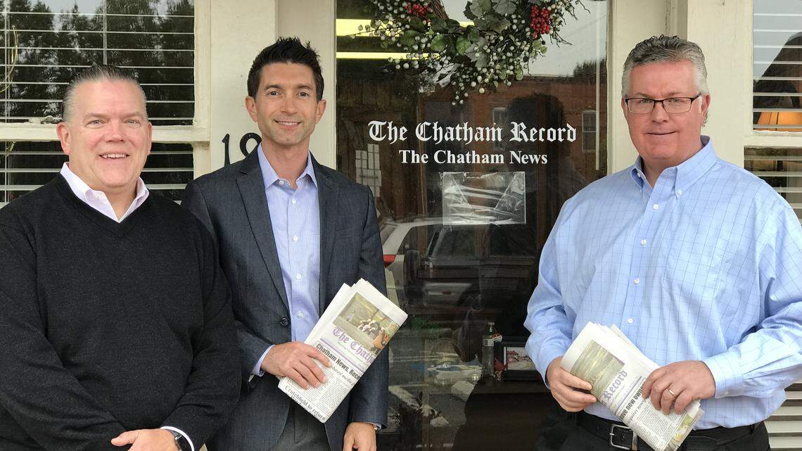 Kirk Bradley (left), Chris Ehrenfeld (middle) and Bill Horner III (right) reached a deal to buy The Chatham Record and The Chatham News this week.