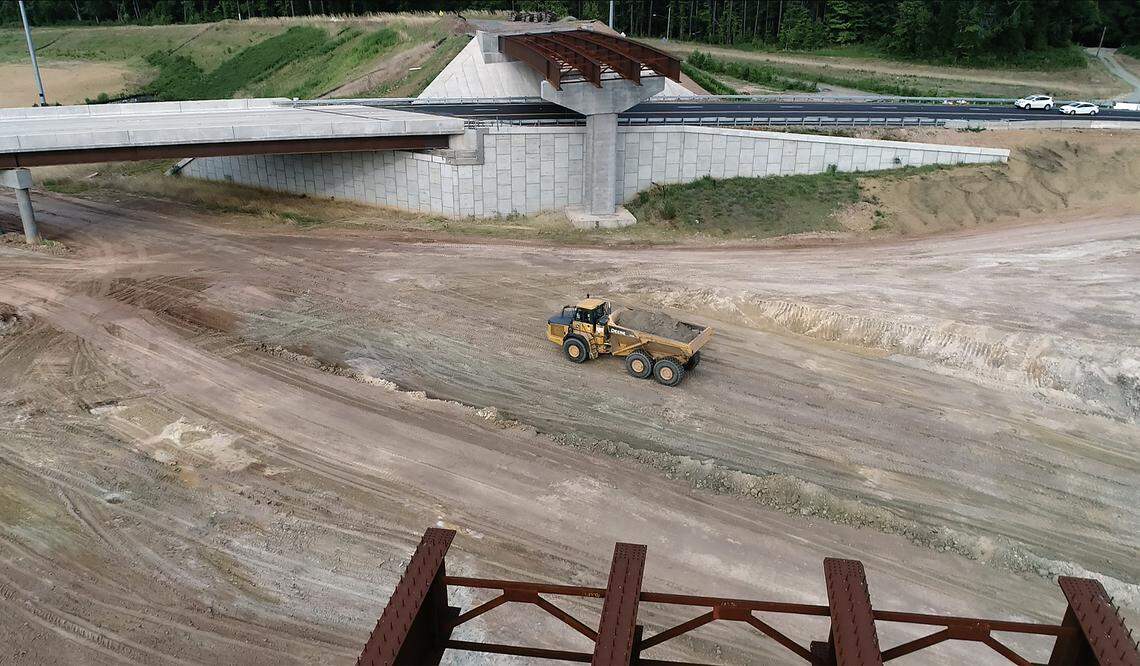 Work continues on the East End Connector at Hwy 70 Wednesday, July 18, 2018. The 3.9 mile highway being built to connect Hwy 147 to US 70 is scheduled to be finished in November off 2019 according to N.C. DOT officials.  The cost of the road will be approximately $150 million.