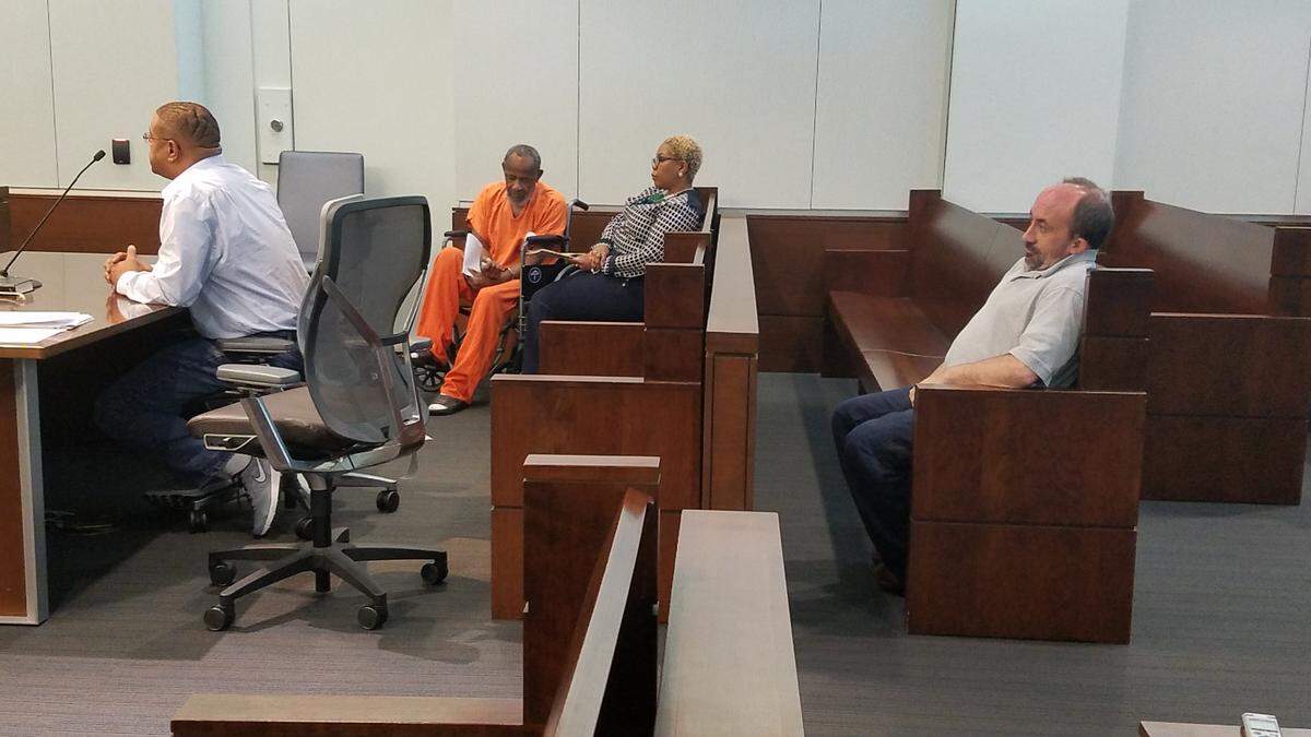Maurice Beckwith sits in Durham County Superior Court on Tuesday July 24, 2018. David Waters, right, sought assault with a deadly weapon charge against Beckwith after an incident in northern Durham October 2016.