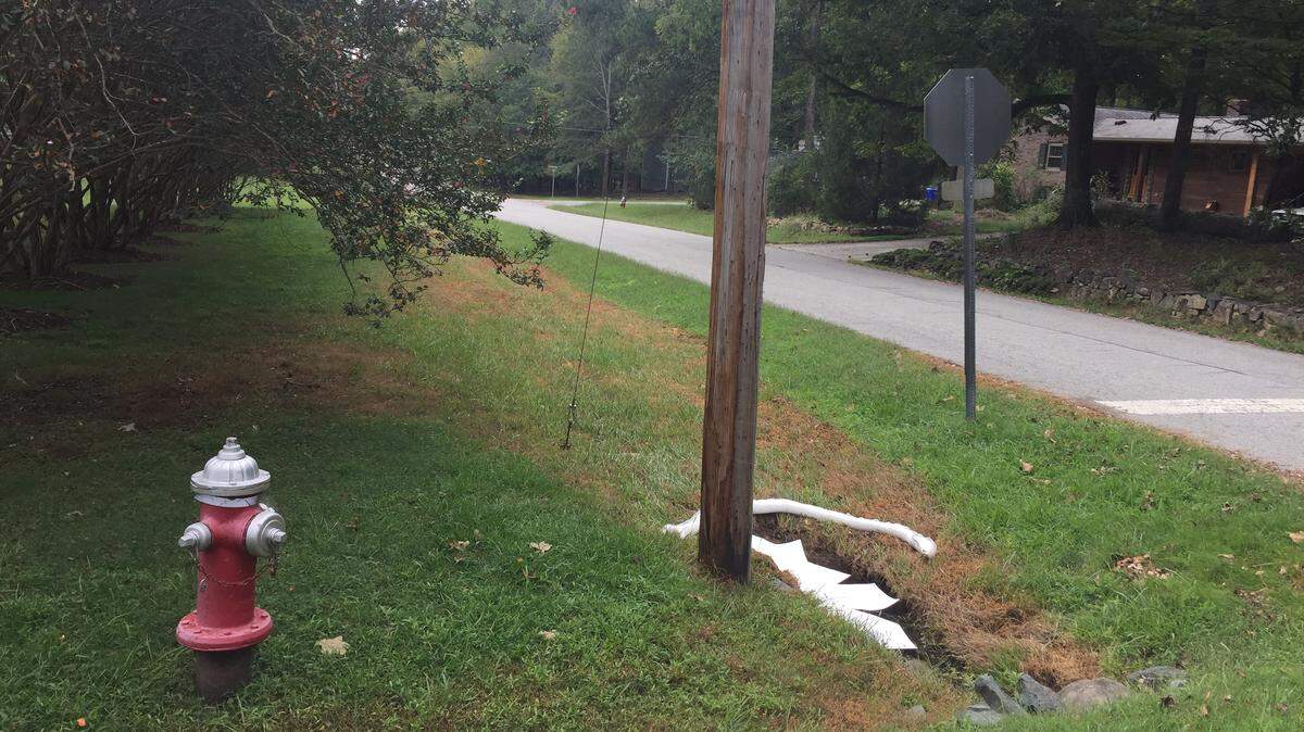 A fuel oil spill in the Plantation Acres neighborhood in Carrboro killed grass in ditches leading to Tom’s Creek.
