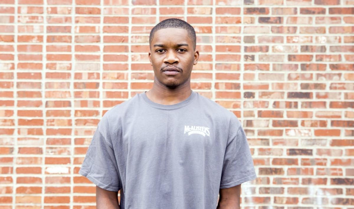 Ledarius Samuel stands for a portrait before beginning a shift at McAllister's Deli on Wednesday, Mar. 28, 2018, in Durham, NC. Samuel was charged with murder in 2017 and spent 376 days in jail before being released on an unsecured bond due to weak evidence. The day after the Herald-Sun published a story about Samuel's release on Mar. 6, he was arrested during a traffic stop for multiple charges and spent 20 more days in jail before the charges were all dropped.