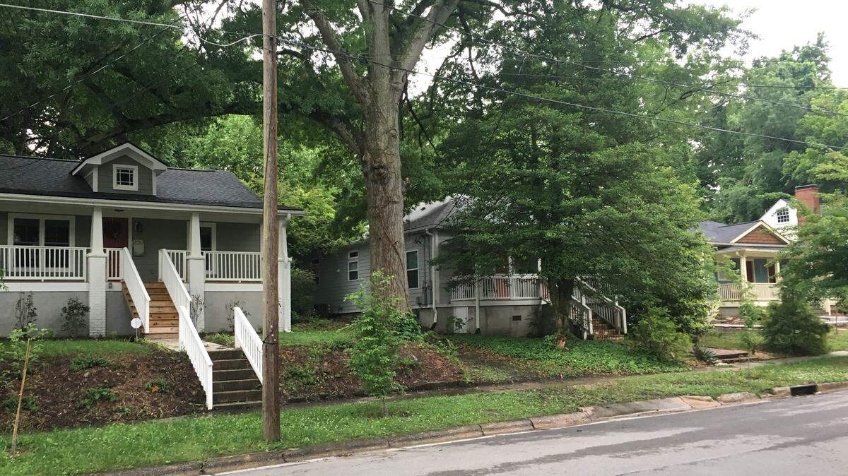 Some houses on Onslow Street in Durham's Walltown neighborhood. The neighborhood's location has made it an attractive area for real estate investors.