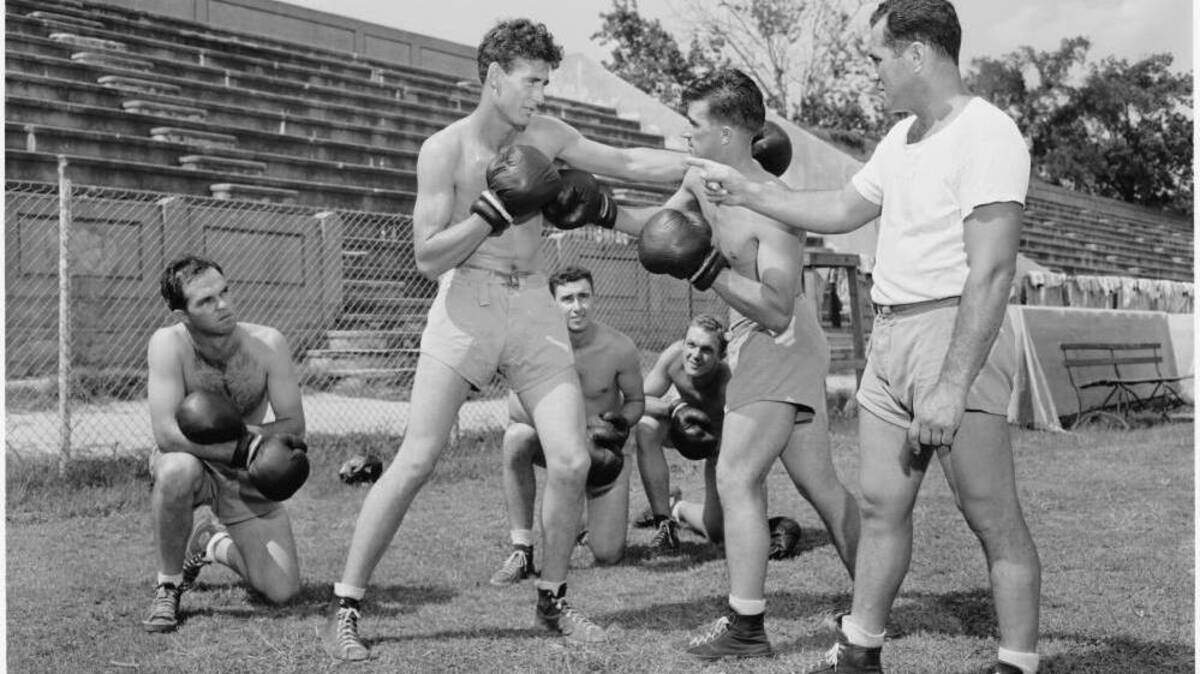 Baseball legend Ted Williams boxes. The book “The Cloudbuster Nine: The Untold Story of Ted Williams and the Baseball Team that Helped Win WWII” focuses on a group of major league baseball players like Williams, who trained in Chapel Hill and went on to fly combat aircraft during the war.