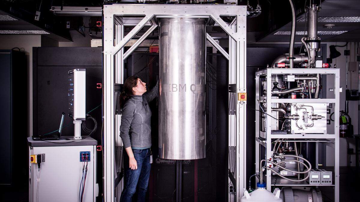 IBM staff member Katie Pooley examines part of a quantum computer at the company’s Thomas J. Watson Research Center in New York. N.C. State University is joining a network that will allow professors and students to use the machine and others like it.