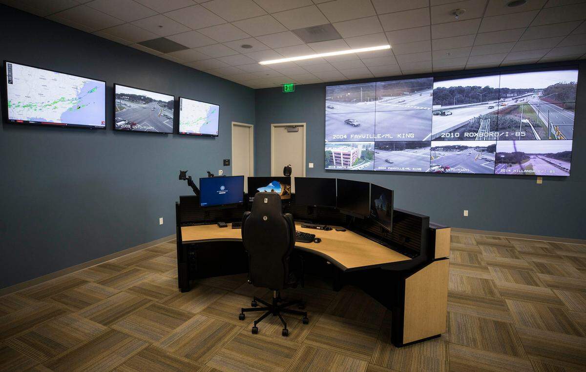 The 911 call center in the new Durham Police Department headquarters and Emergency Communications Center is equipped with standing desks, blue lights that help employees stay awake on long shifts, and a balcony where employees can take breaks from the stress of the job. 