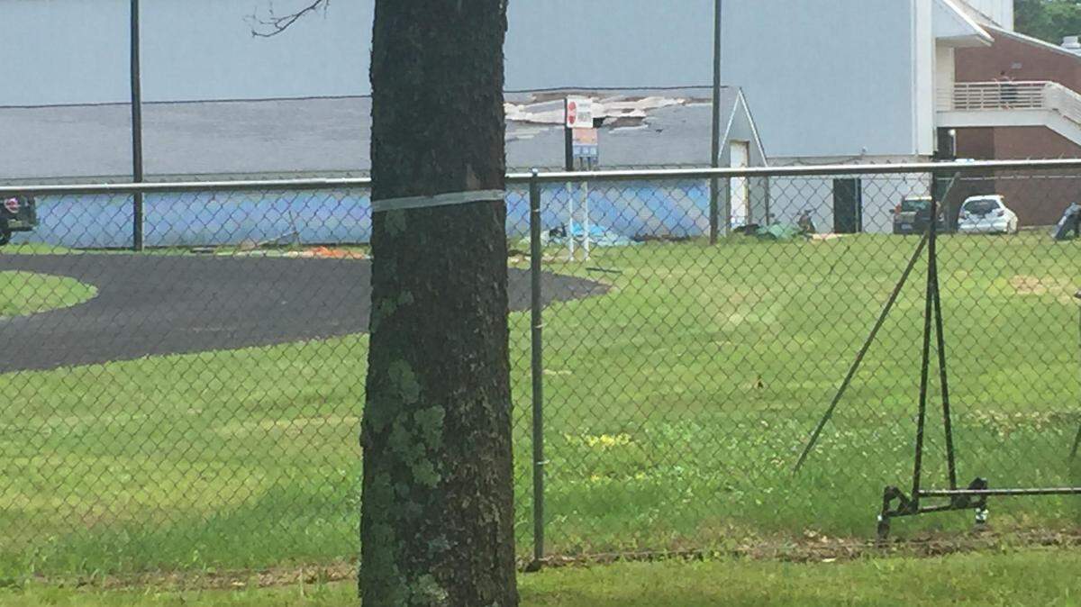 Northern High School was once a state powerhouse in football. Parents point to the large hole in the roof near the track as example of the repairs needed while students await construction of a new high school.