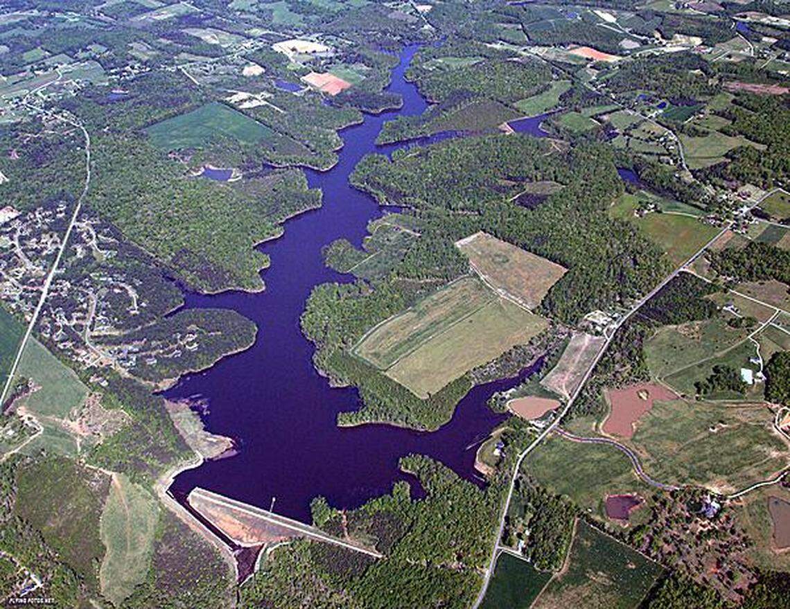 Work started in late March 2018 to expand the West Fork Eno Reservoir in Cedar Grove, north of Hillsborough. The reservoir's dam can be seen in the bottom center of this photo. The auxiliary spillway, filled with water when the photo was taken, is to the dam's left.