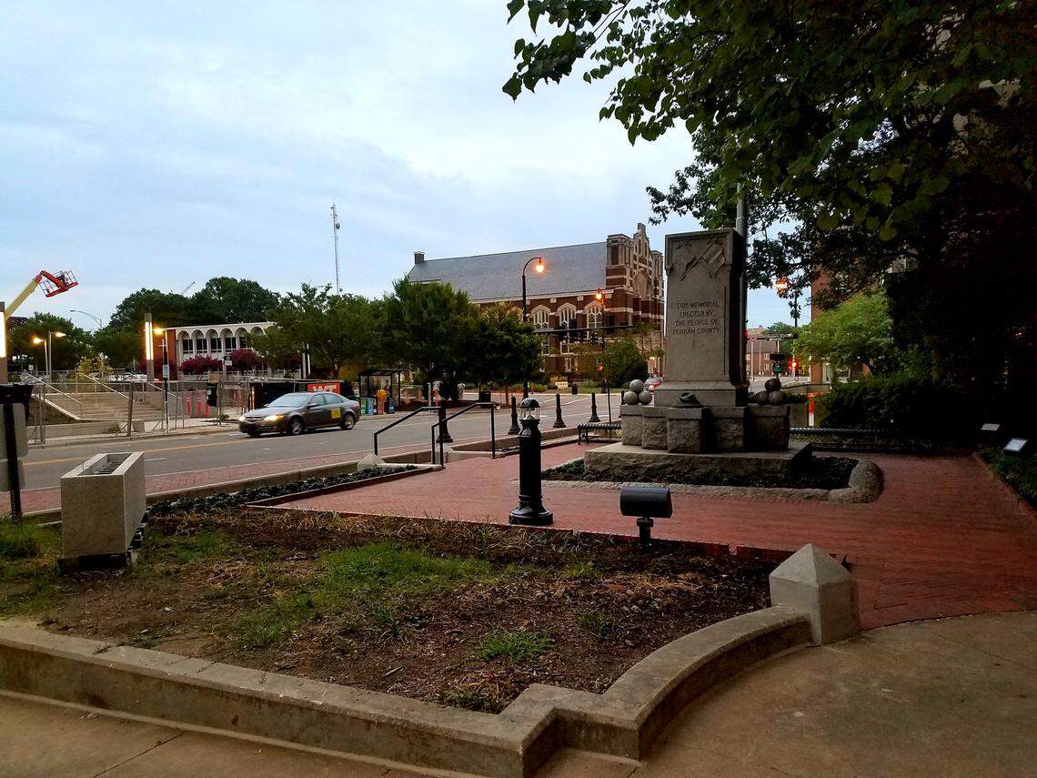 The base of the Confederate monument in downtown Durham remains after protesters brought down the soldier statue in 2017. In 2018, the county made the monument more accessible with brick pavers, steps leading up to it and a bench nearby.