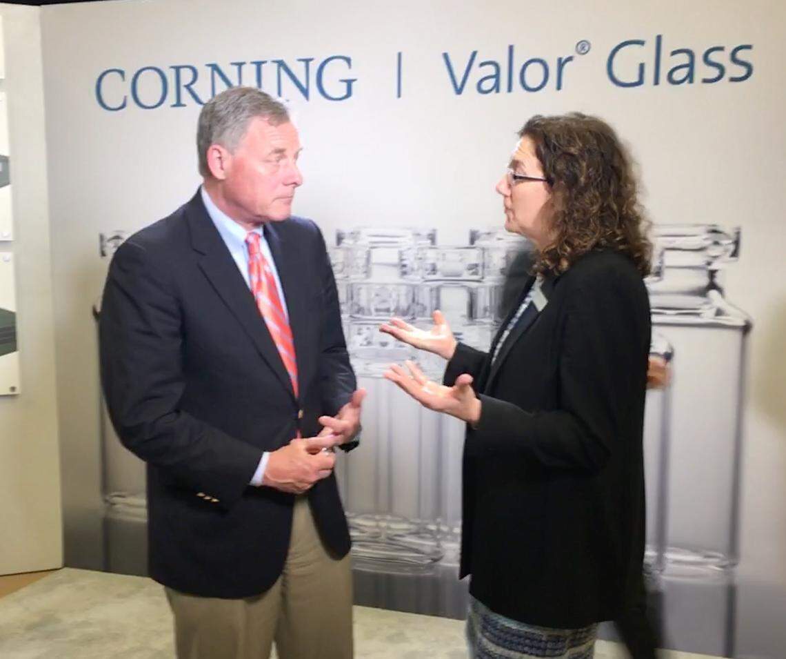 N.C. Sen. Richard Burr talks with Durham County Commissioner Wendy Jacobs at the Corning manufacturing facility in Durham County on Wednesday, April 4.