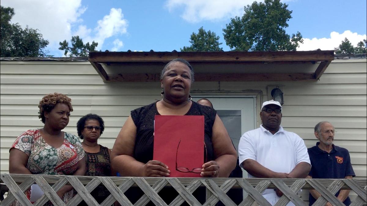 Naeema Muhammad with the NC Environmental Justice Network called on hog farmers and their neighbors to start a conversation about their concerns during a press conference in Warsaw, North Carolina.