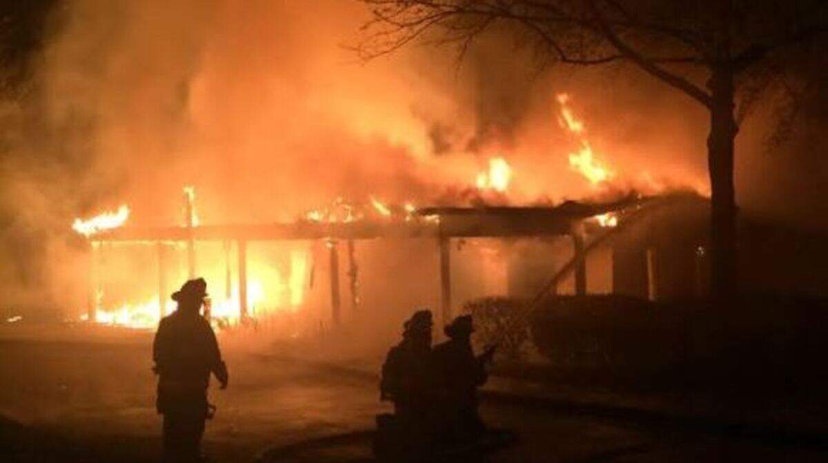 Treyburn Country Club's tennis clubhouse burns Sunday morning in Durham.