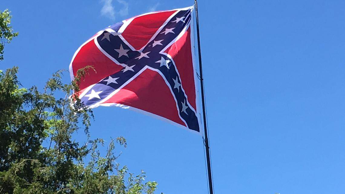 A Confederate flag flies over Highway 70 in Orange County, North Carolina.