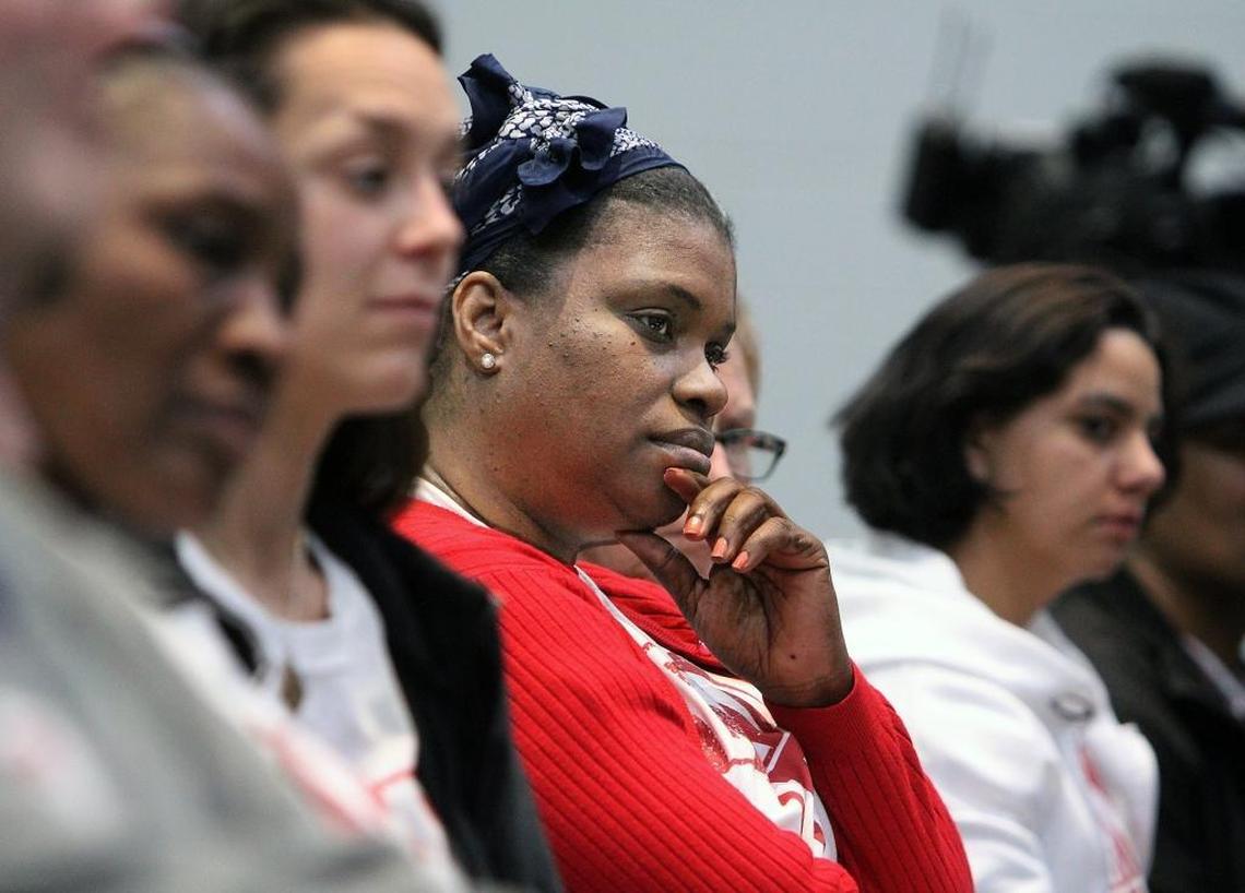 Latarndra Strong, of the Hate Free Schools Coalition, listens to speakers at the Orange County Schools Board of Education meeting Monday, Feb. 27, 2017.