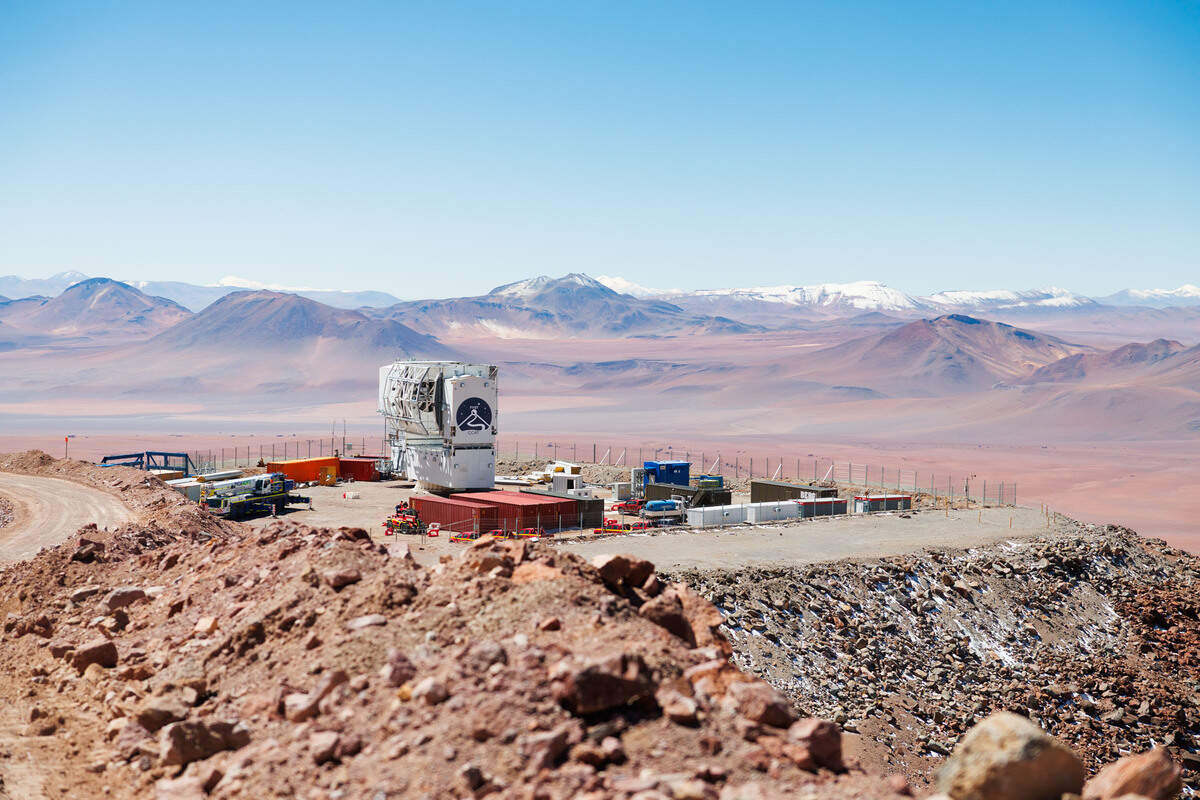 The FYST rises above the surrounding desert in an other-worldly landscape.