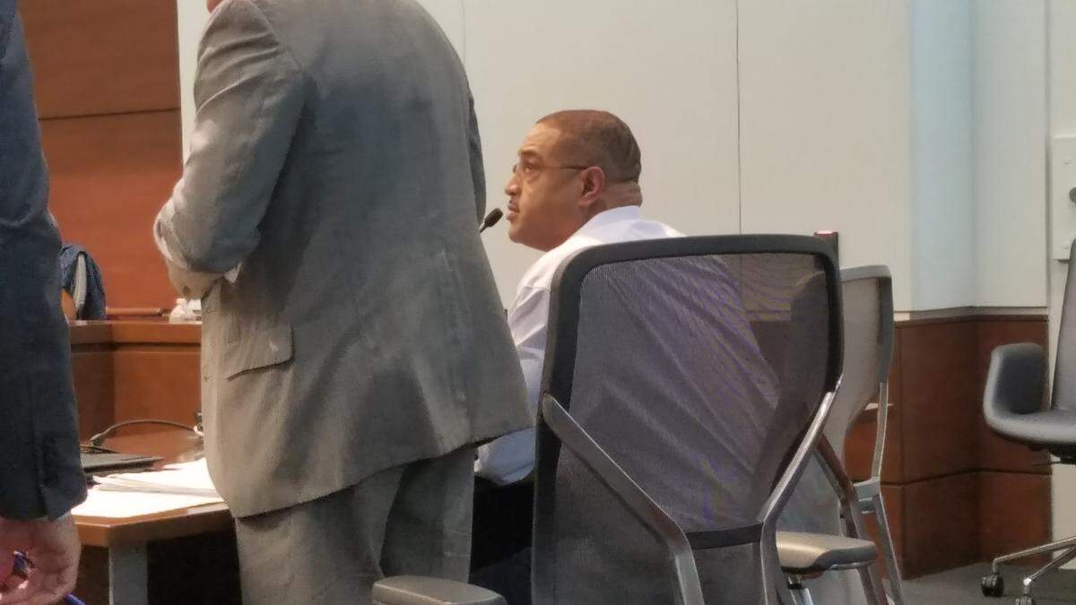Maurice Beckwith seated next to his attorney Woody Vann during a Durham County Superior Court hearing on Tuesday, July 24, 2018.