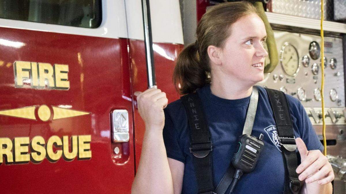 Annie Hoxie, 28, has been a firefighter for two and a half years and wants to someday be battalion chief, the highest rank her father, Craig Hoxie, achieved before retiring from the Durham Fire Department