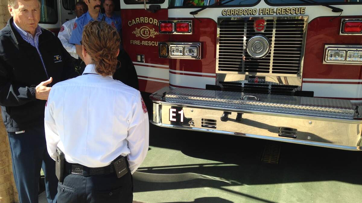 State Insurance Commissioner Mike Causey chats with Carrboro Fire Chief Susanna Williams during a tour of Carrboro Fire Station 1 on Monday, April 29, 2018.