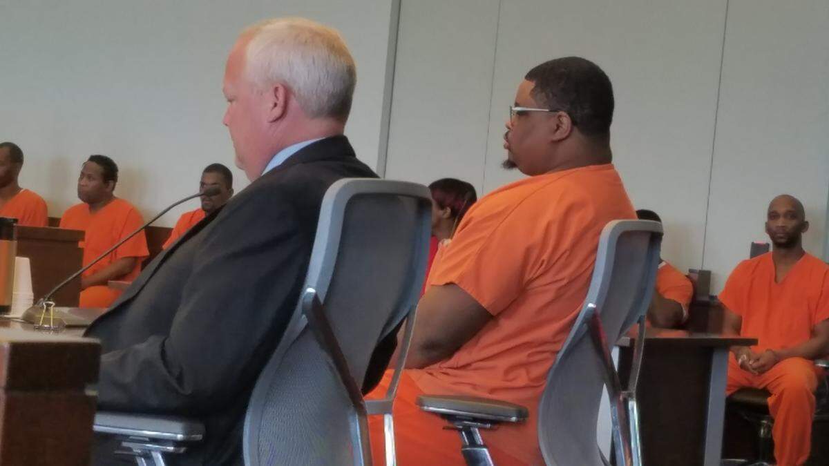 From left to right., defense attorney Daniel Meier and Dominique Lamberth in a Durham County Superior Court plea hearing on Wednesday, August 1, 2018.