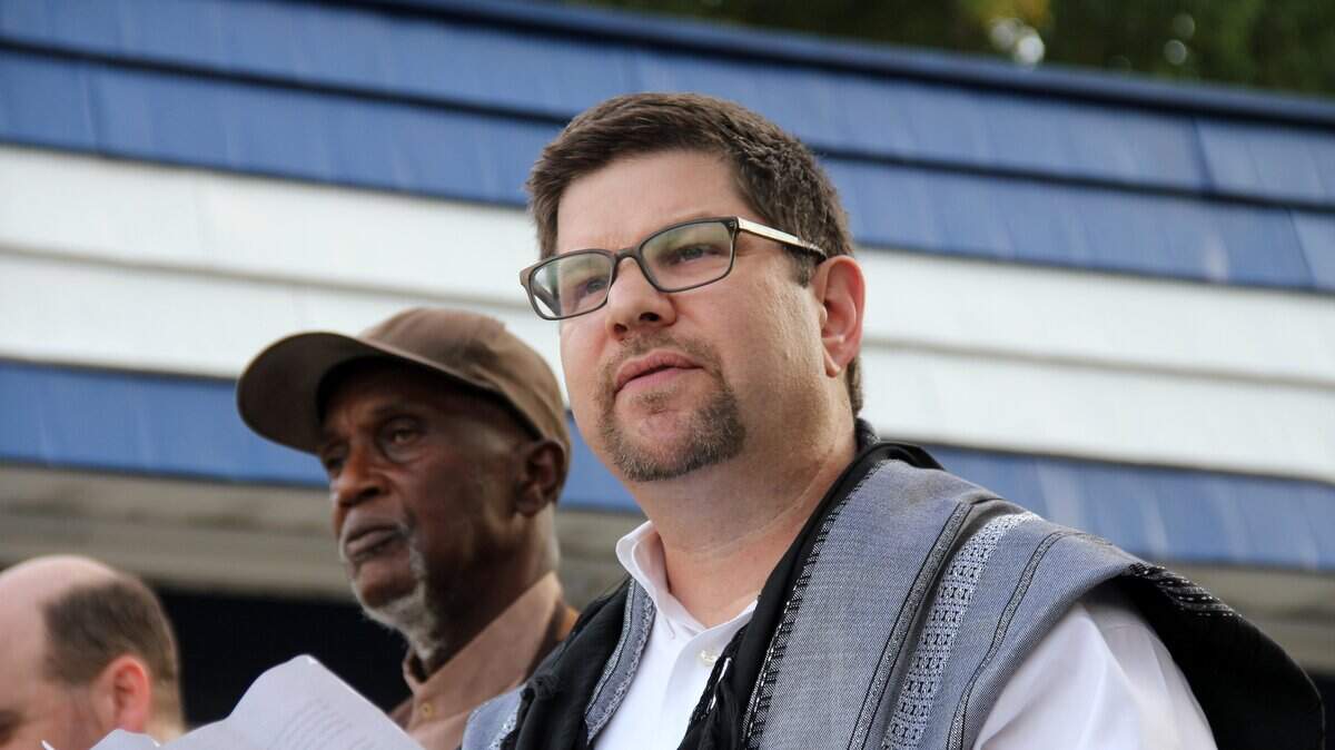 Rabbi Larry Bach of Judea Reform Congregation speaks at a vigil held by the Religious Coalition for a Nonviolent Durham on Thursday night, July 30, 2015. Brach was recently forced to resign from Judea Reform after congregation leaders found out about a censure by the Central Conference of American Rabbis.