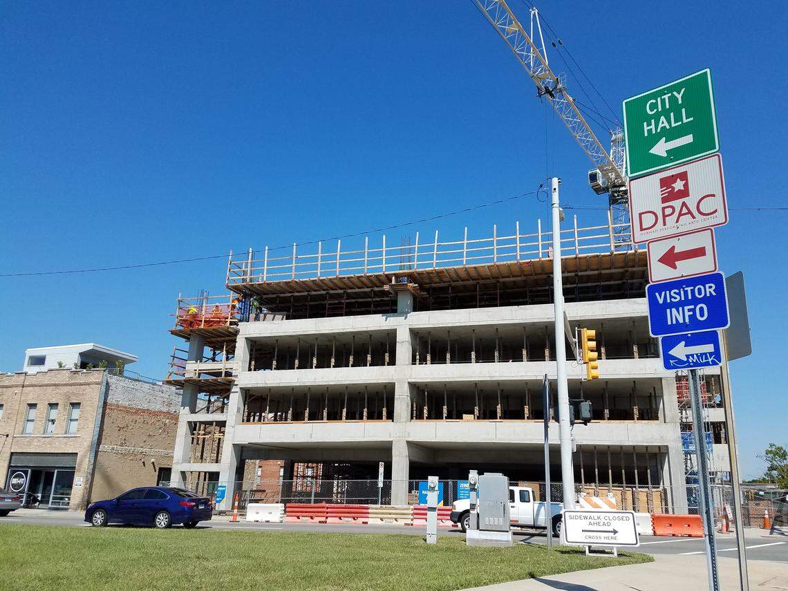 A city-owned mixed use parking garage at Mangum and Morgan streets should be finished in 2019, alleviating some of the parking needs downtown.