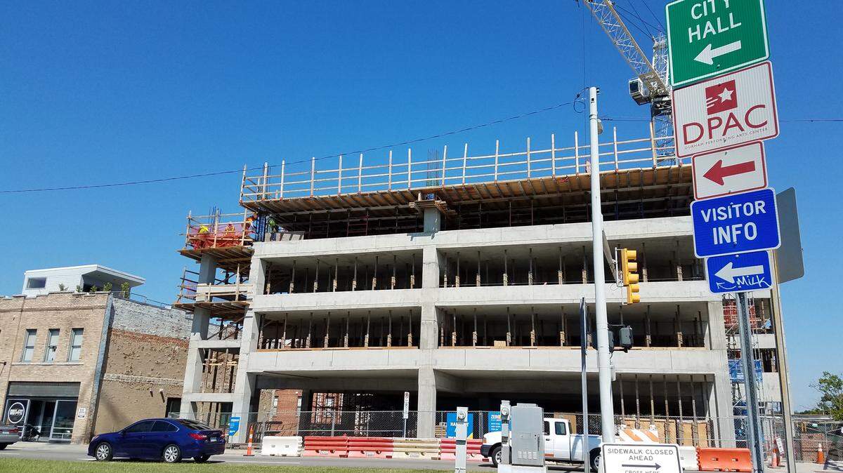 A city-owned mixed use parking garage at Mangum and Morgan streets should be finished in 2019, alleviating some of the parking needs downtown.