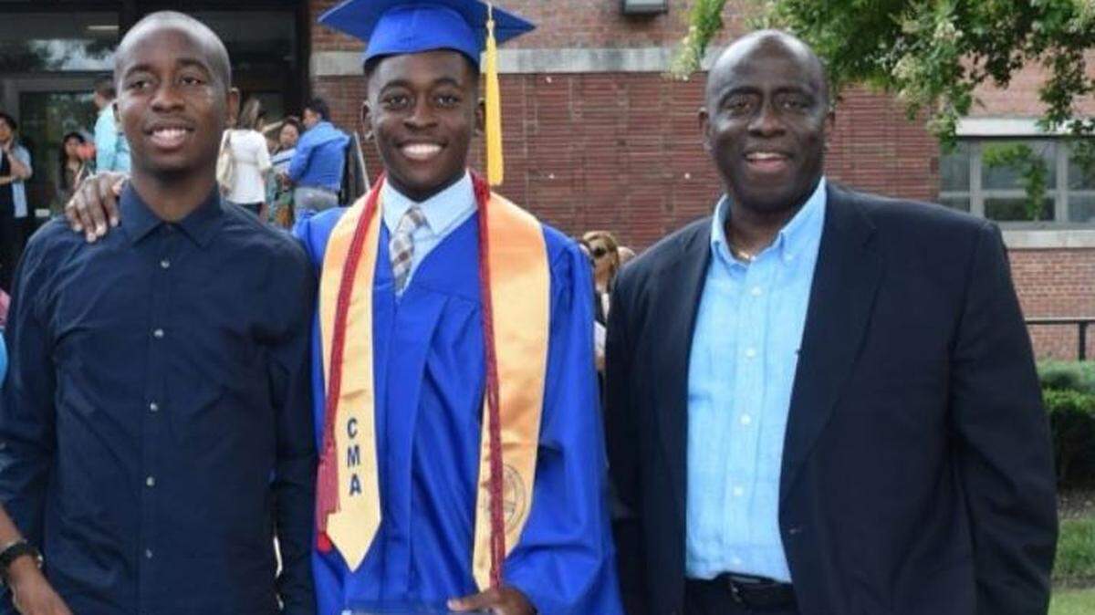 Ademola Shobande, right, with his sons Ayobani Shobande (left), 17, and Oluwadurotini Shobande (center), 19.