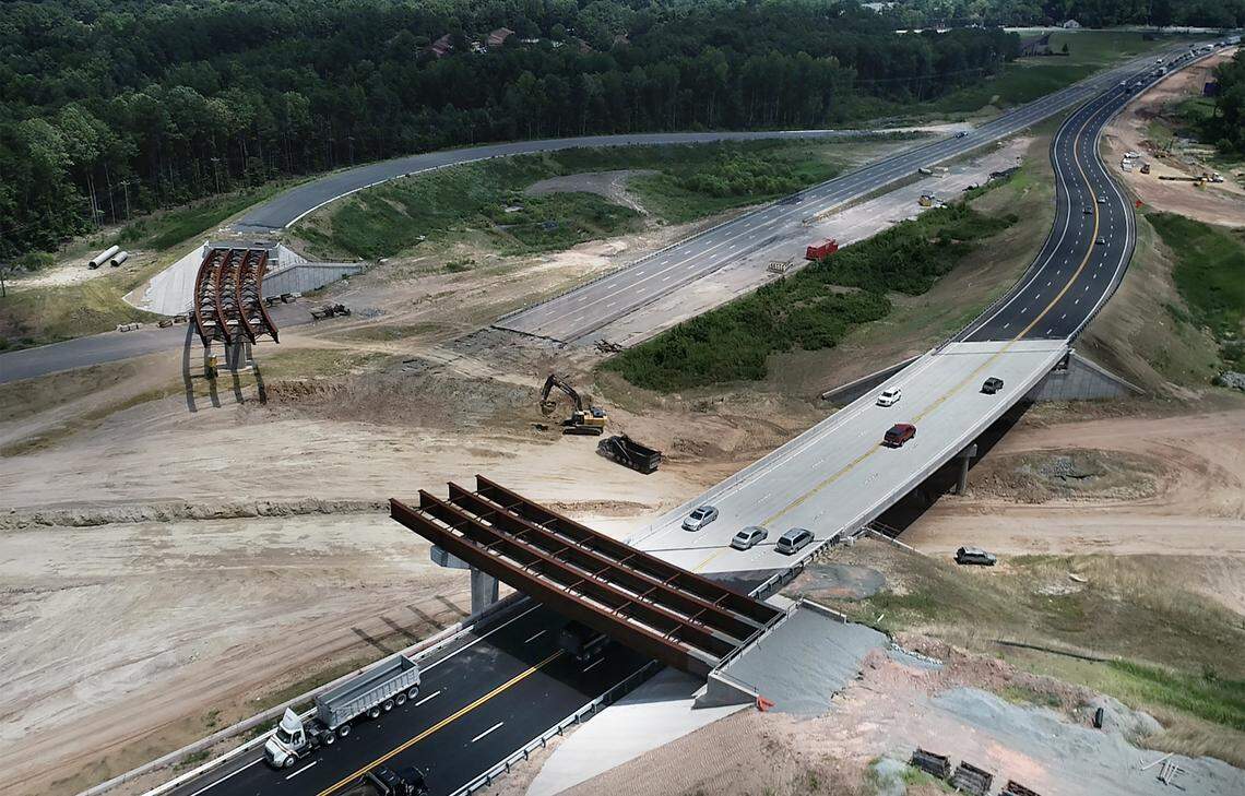 A view looking south on US 70 as work continues on the East End Connector Wednesday, July 18, 2018. The 3.9 mile highway being built to connect Hwy 147 to US 70 is scheduled to be finished in November off 2019 according to N.C. DOT officials.  The cost of the road will be approximately $150 million.