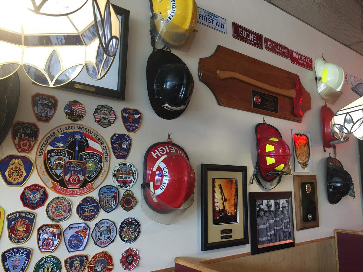 Barry’s Cafe in west Raleigh is the headquarters for Feed the Firefighters, a nonprofit that has created a scholarship fund to aid Wake County first responders pay for their education.