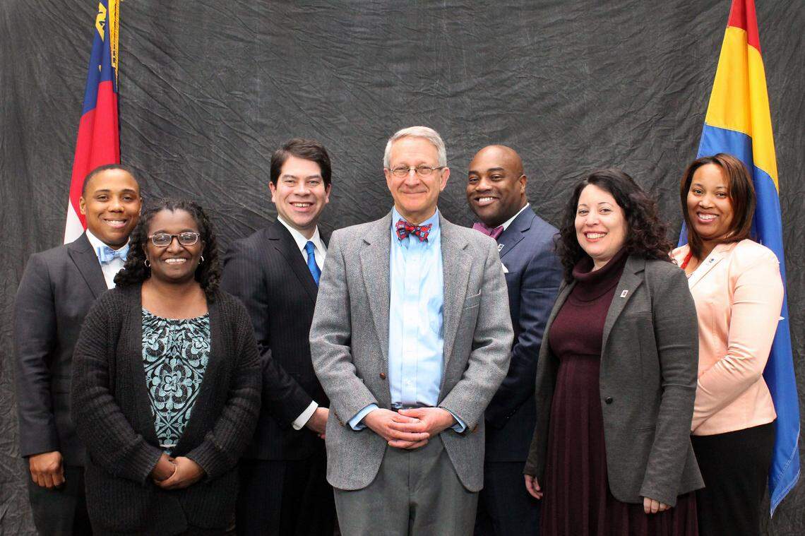 Durham City Council, left to right: Council member Vernetta Alston, Mayor Pro Tem Jillian Johnson, Council member Charlie Reece, Mayor Steve Schewel, and Council members Mark-Anthony Middleton, Javiera Caballero and DeDreana Freeman.