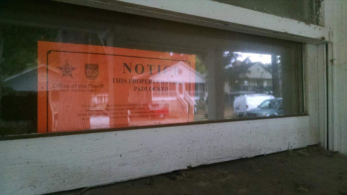 A "writ of possession" notice on a house in the Walltown area of Durham in 2017.