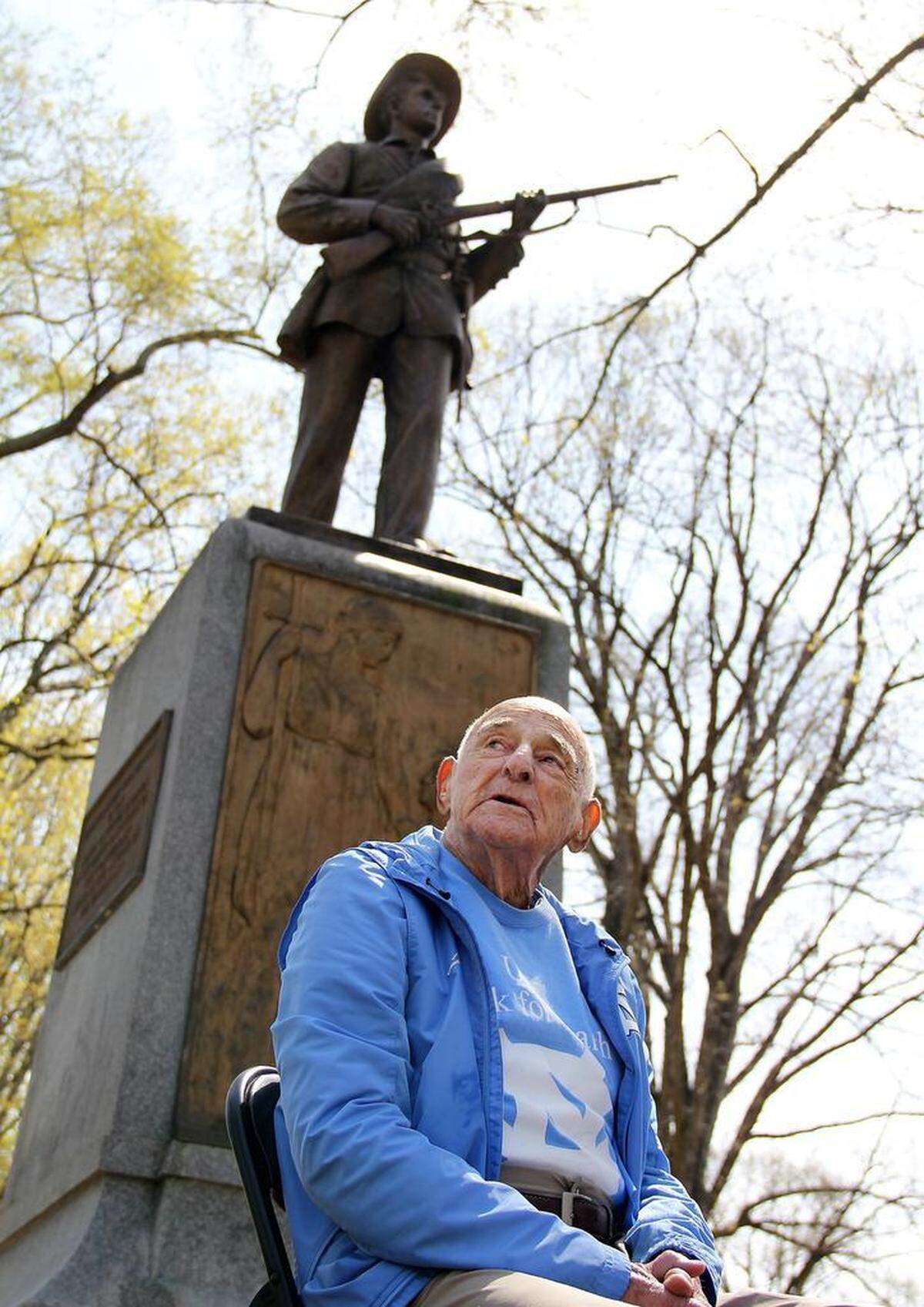 "I thought it was just a beautiful thing (when I was in school); I didn't know there was a controversy," says Bobby Gersten, 97, in front of Silent Sam on the UNC-Chapel Hill campus Sunday, April 8, 2018. Today UNC's oldest living former basketball and baseball player says the Confederate monument should probably come down. "Too bad because it's a beautiful thing, but it really has no place."