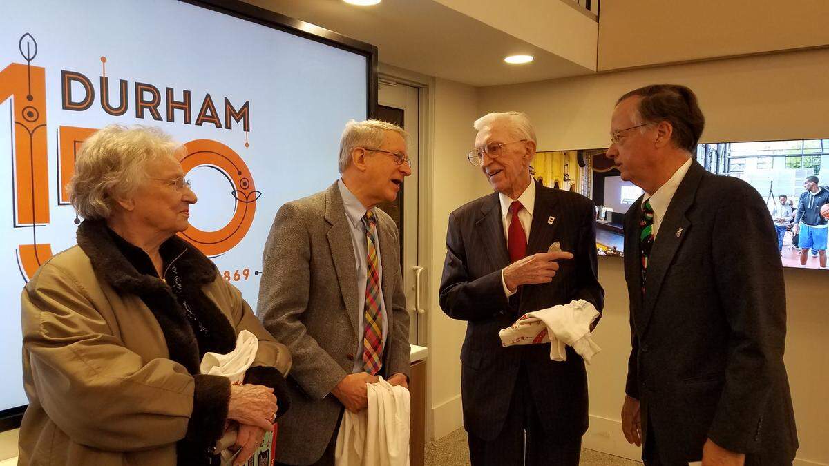 Former Durham Mayor Sylvia Kerckhoff, Mayor Steve Schewel and former mayors Wense Grabarek and Nick Tennyson talk after a press conference launching the 150th anniversary of the city’s incorporation.