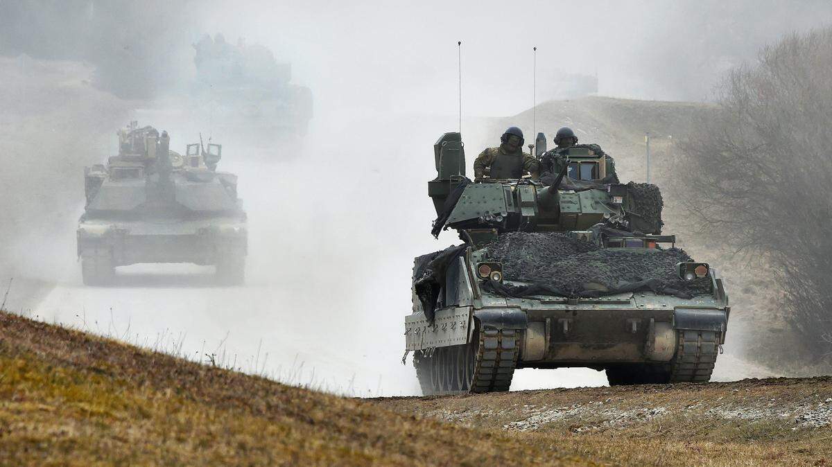 A Bradley Fighting Vehicle leads a column of M1A1 Abrams tanks during a recent exercise in Germany. Helping orchestrate work on a replacement for the Bradley is a priority for the "Army Futures Command" that local officials hope the Army places in the Triangle.