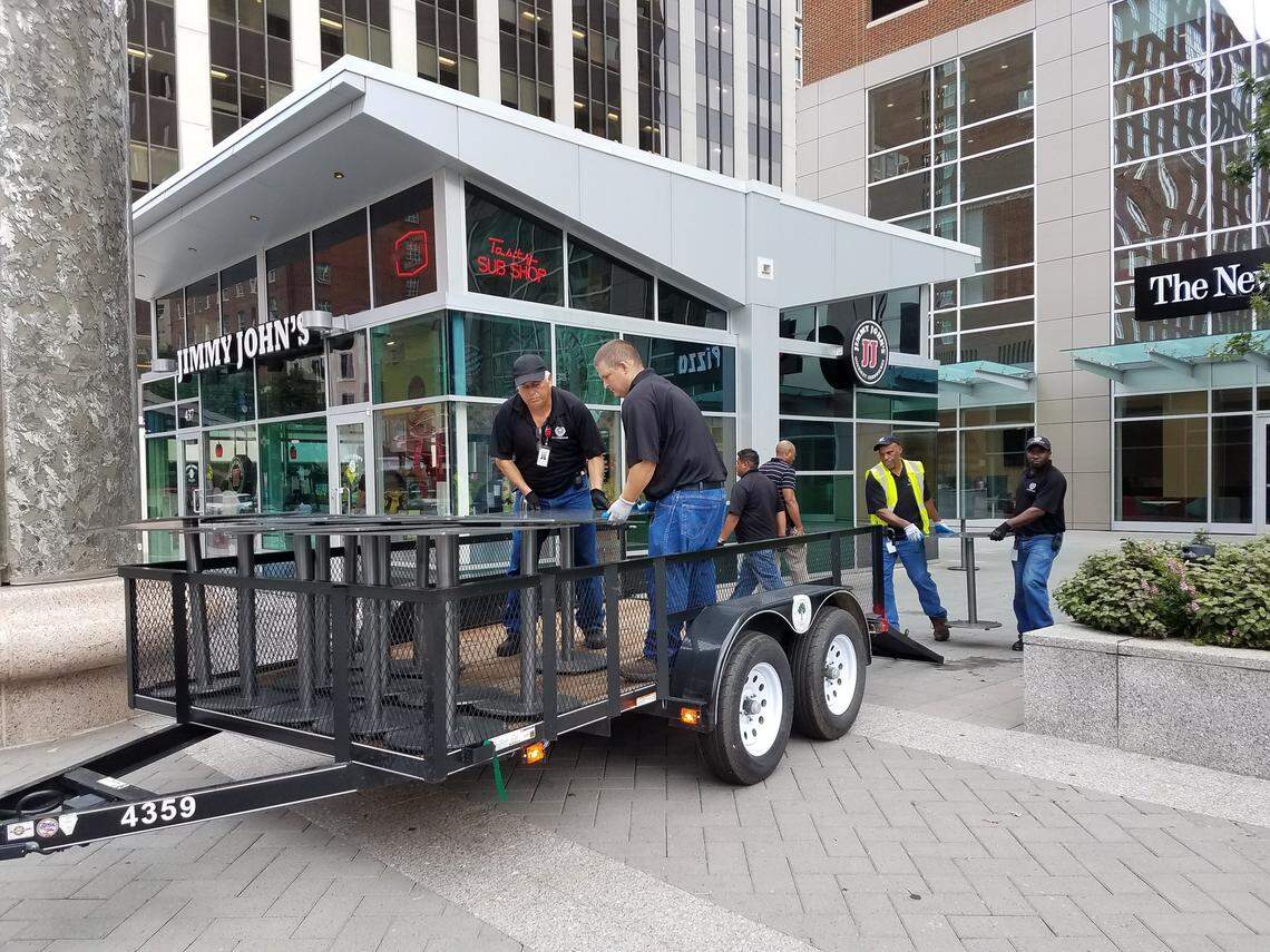 City of Raleigh Transportation Department employees removed tables from City Plaza on Fayetteville Street in downtown Raleigh Wednesday morning ahead of Hurricane Florence, which is expected to bring wind and rain by Thursday night.