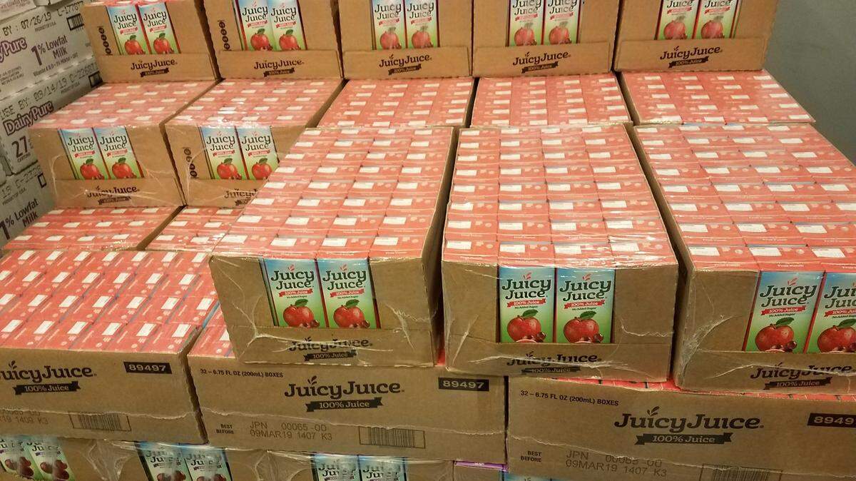 Boxes filled with juice boxes for children will be packed in bags at the Inter-Faith Food Shuttle’s new Child Food Hub for the BackPack Buddies program that serves more than 2,000 children in the Triangle area each week.