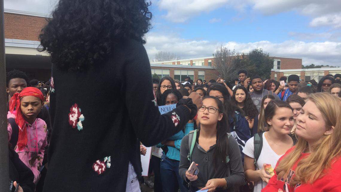Jordan High School students listen to Aminah Jenkins during a gun-control rally at the school in February. Jenkins is now speaking out against a student-athlete recorded on a video using the N-word and making a sexist remark.