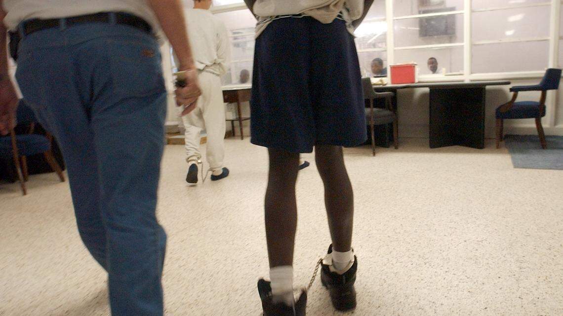 In this 2015 file photo, juveniles arrive in shackles and handcuffs at the Dillon Regional Juvenile Detention Center, which is currently being used to house minors waiting for thier case to work its way through the juvenile justice system. 