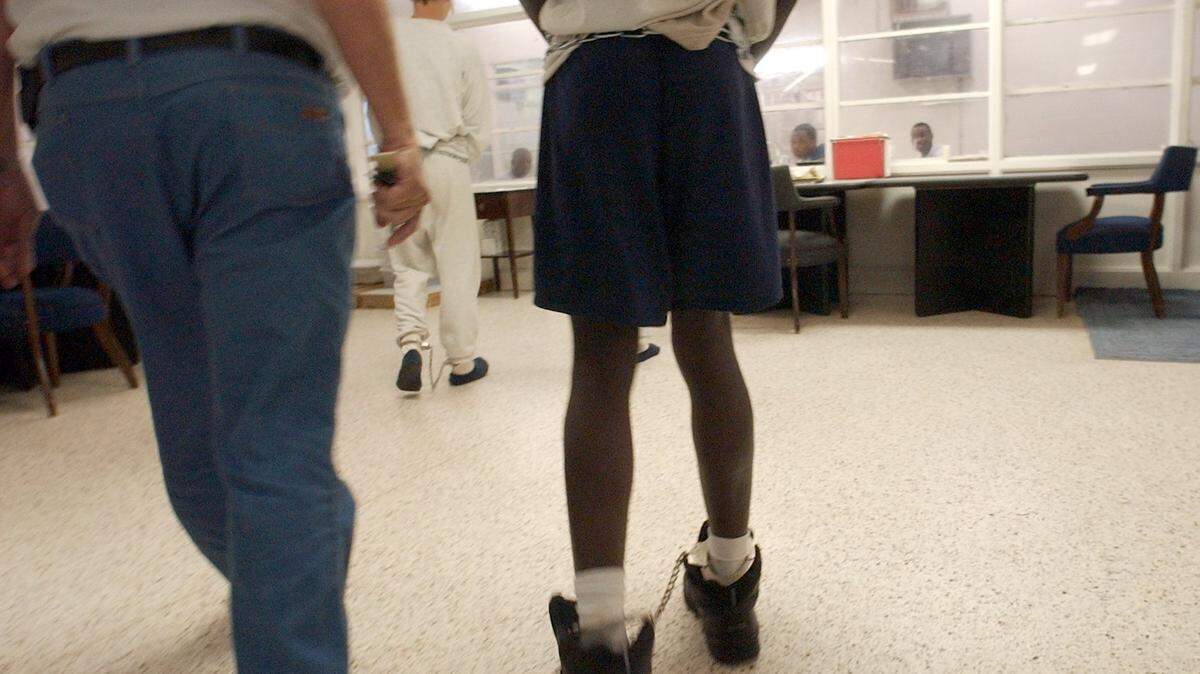 In this Raleigh News & Observer file photo, juveniles arrive in shackles and handcuffs at a North Carolina facility.