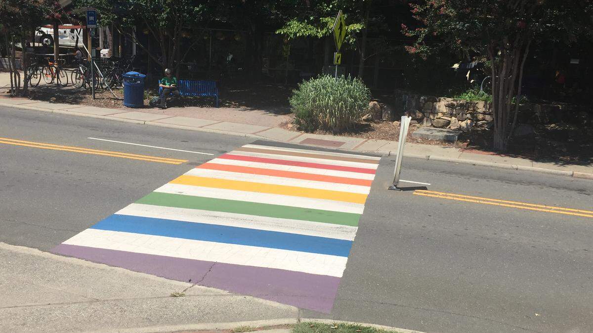 A crosswalk in Carrboro was recently painted in rainbow colors.